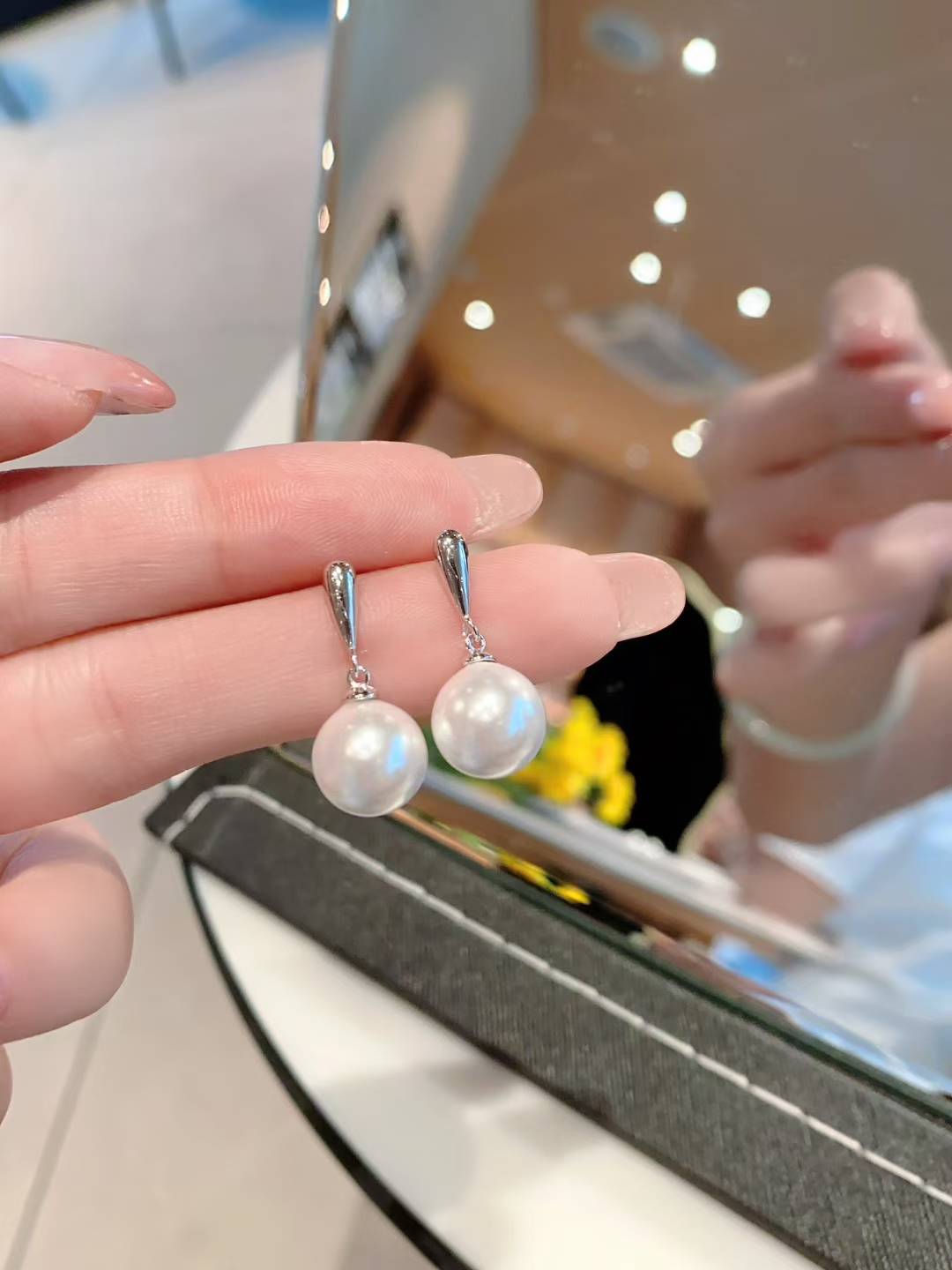 Pearl & 18K Gold | These (light luxury) textured gold-clasp pearl earrings are the epitome of elegance once worn.