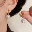 Pearl & 18K Gold | These (light luxury) textured gold-clasp pearl earrings are the epitome of elegance once worn.