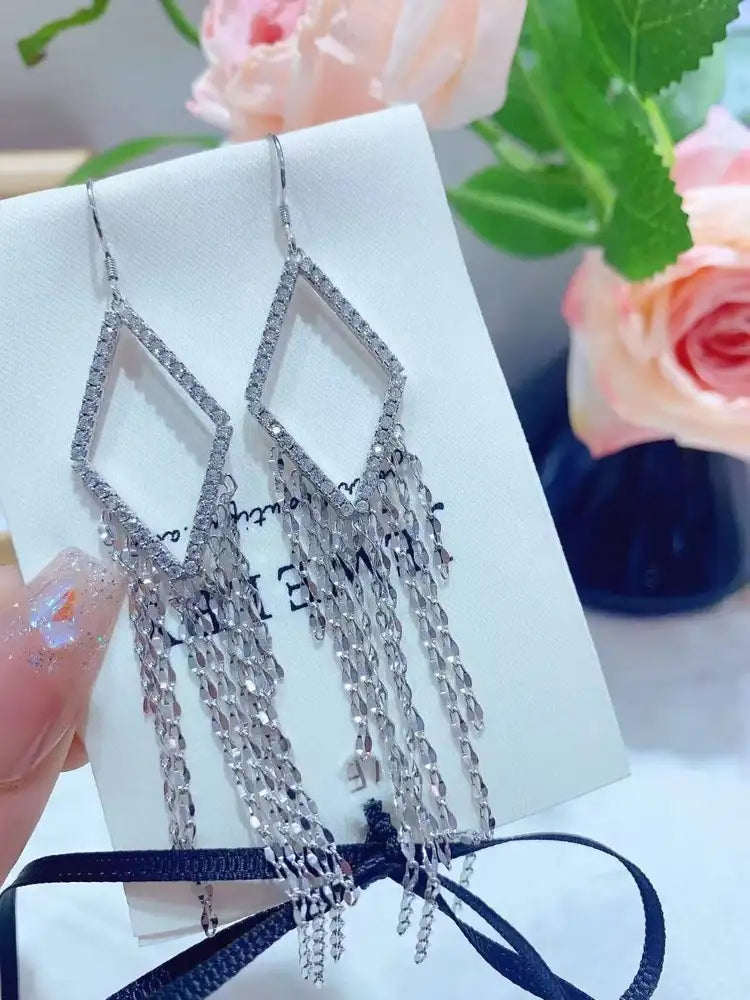 925 Silver with Lab-Grown Diamonds | The ultimate showstopper for banquets! Diamond tassel earrings shine brilliantly